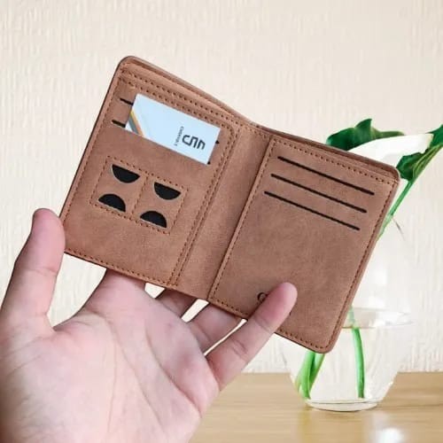 Pak wallets premium tan leather M-wallet featuring multiple card slots and a slim, durable design for daily use.